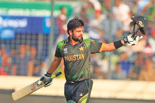 Ahmed Shehzad takes a bow after the Pakistan opener scored a century against Bangladesh in their ICC World Twenty20 clash at the Sher-e-Bangla National Stadium in Mirpur yesterday. PHOTO: FIROZ AHMED