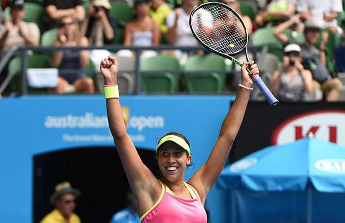 Madison Keys of the US celebrates winning her women's singles match against compatriot Venus Williams, on day ten of the Australian Open, in Melbourne, on January 28, 2015. Photo: AFP
