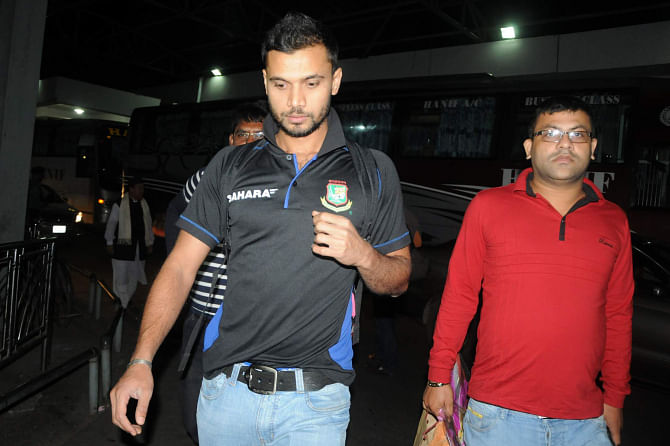 Bangladesh captain Mashrafe Bin Mortaza upon arrival at the Hazrat Shahjalal International Airport last evening. The Tigers and the Zimbabweans returned to Dhaka from their trips to Khulna and Chittagong and now play the last three ODIs in Mirpur. PHOTO: STAR