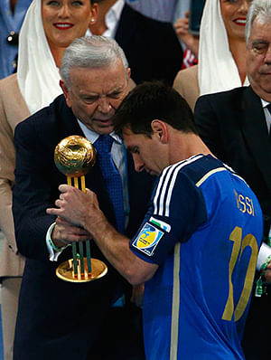 Jose Maria Marin, President of the CBF, presents Lionel Messi of Argentina with the Golden Ball during the 2014 FIFA World Cup Brazil Final match between Germany and Argentina at Maracana on July 13, 2014 in Rio de Janeiro, Brazil. Photo: Getty Images