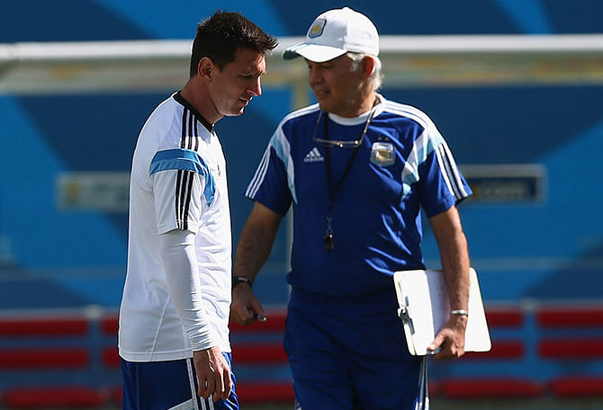 Lionel Messi of Argentina and coach Alejandro Sabella during a training session at Arena de Sao Paulo ahead of their 2014 FIFA World Cup Brazil round of 16 football match against Switzerland. Photo: Getty Images