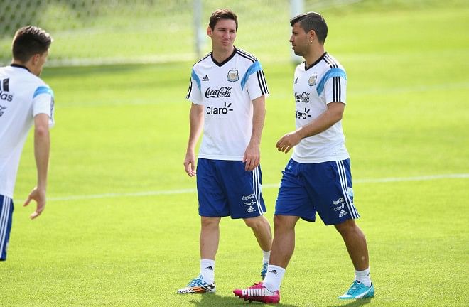 Argentina's striking pair of Lionel Messi (L) and Sergio Aguero will look for better understanding up front against Iran today. PHOTO: GETTY IMAGES