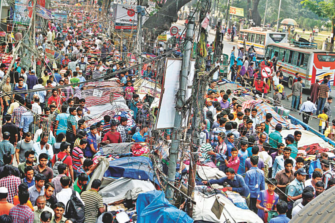 Makeshift shops have long been occupying this footpath near Tejgaon College. Photo: Anisur Rahman