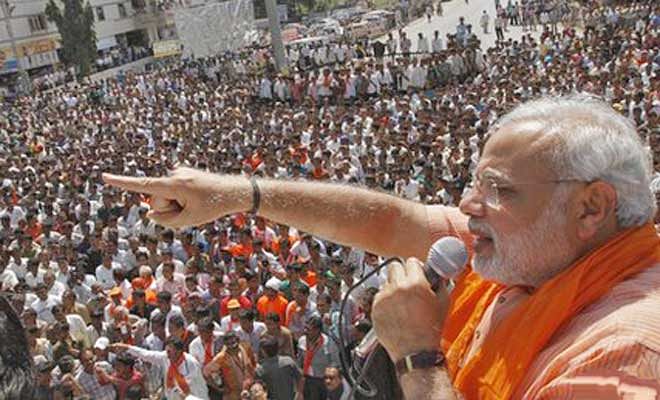 This STAR file photo shows Narendra Modi speaks to a mass gathering at Kerala, India, before Lok Shava polls