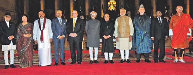 Jatiya Sangsad Speaker Shirin Sharmin Chaudhury, second from left, with the leaders of Saarc countries and new Indian Prime Minister Naredra Modi, fourth from right, and Indian President Pranab Mukherjee, fifth from right, after the swearing-in ceremony for Modi at the Rastrapati Bhavan in New Delhi yesterday. Photo: courtesy