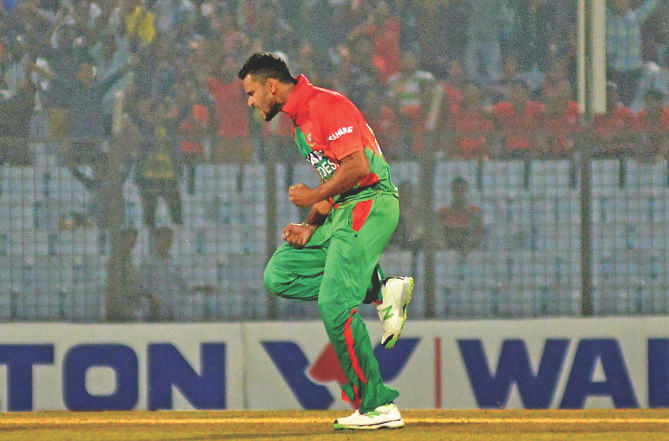 Mashrafe Bin Mortaza showed plenty of signs of rolling back the years. Here the Narail Express is seen exulting after dismissing Zimbabwe opener Hamilton Masakadza with a venomous in-swinger. His three early blows fashioned Bangladesh's facile 68-run win in the second ODI in Chittagong yesterday.   PHOTO: ANURUP KANTI DAS