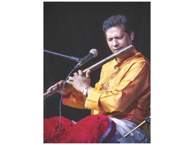 Mortuza Kabir Murad perform at the event.    