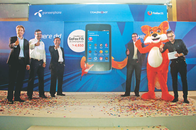 Rolv-Erik Spilling, executive vice president of Telenor; Vivek Sood, CEO of Grameenphone; and Andreas Gal, chief technology officer at Mozilla, attend the unveiling of Firefox-based smartphone developed by Symphony, in Dhaka yesterday. Photo: GP