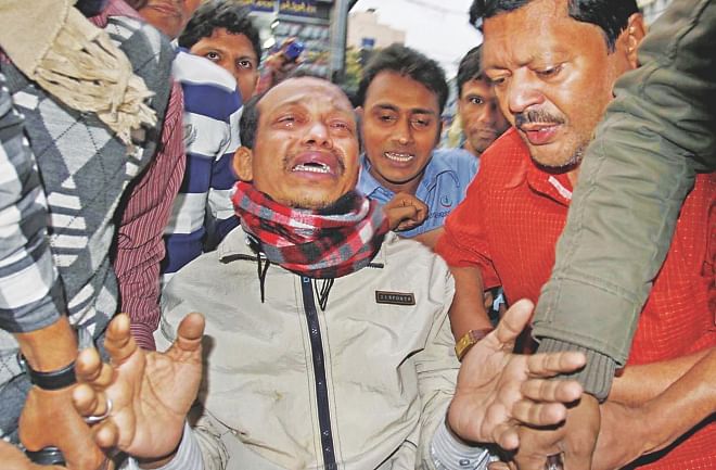 Mridul Kumar Chowdhury breaks down in tears as he is brought to a Chittagong private hospital after his rescue yesterday, six days after his abduction.   Photo: Star 