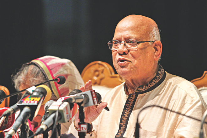 Finance Minister AMA Muhith speaking at the post-budget press conference held at the Osmani Memorial Auditorium yesterday.  Photo: Star