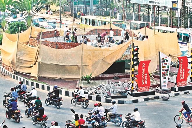 A few hundred metres down the street, the pretty fountain at Bijoy Sarani intersection is being demolished to make way for a “multi-colour musical fountain”. Photo: Anisur Rahman/File