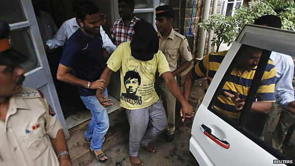 Five men, including a juvenile, were accused over the gang rape of the photojournalist 