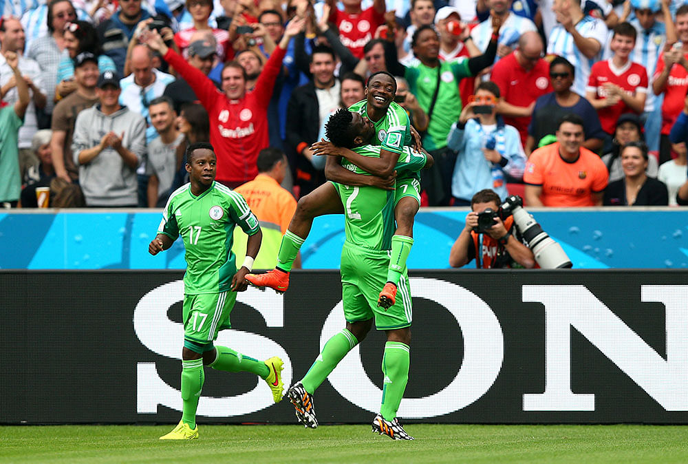 Ahmed Musa (R) of Nigeria celebates scoring his team's first goal with his teammates Joseph Yobo (C) and Ogenyi Onazi (L) during the 2014 FIFA World Cup Brazil Group F match between Nigeria and Argentina at Estadio Beira-Rio on June 25, 2014 in Porto Alegre, Brazil. Photo: Getty Images
