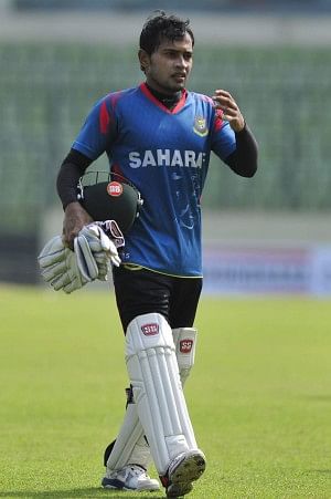 Test captain Mushfiqur Rahim walks off the pitch after a productive nets session at the Sher-e-Bangla National Stadium yesterday, ahead of their match against Zimbabwe today. PHOTO: STAR