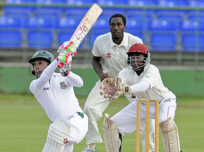 Bangladesh skipper Mushfiqur Rahim hits one over the top during the first day's play of the three-day practice match against St Kitts and Nevis at St Kitts on Saturday. PHOTO: WICB