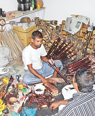 Musical instrument makers are passing busy days leading to the festival. Photo: Star
