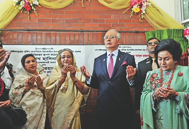 The Malaysian Premiere Najib Razak along with Prime Minister Sheikh Hasina is seen at an innaguration ceremony of a hospital-cum-nursing collage at Gazipur in November. 