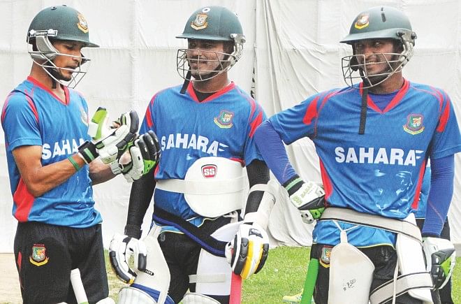 Bangladesh A skipper Nasir Hossain (L) shares some thoughts with teammates during their last practice session at Mirpur yesterday, on the eve of their departure for West Indies. PHOTO: STAR