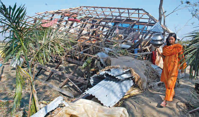 Houses damaged by the cyclone Sidr. Photo: Anisur Rahman