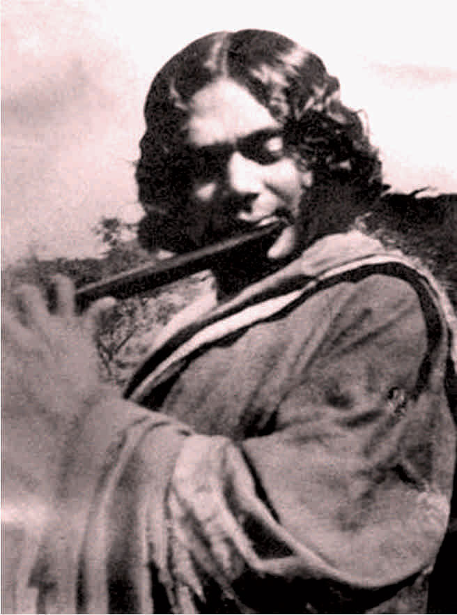 Kazi Nazrul Islam playing flute in 1926, Chittagong. Photo: Courtesy