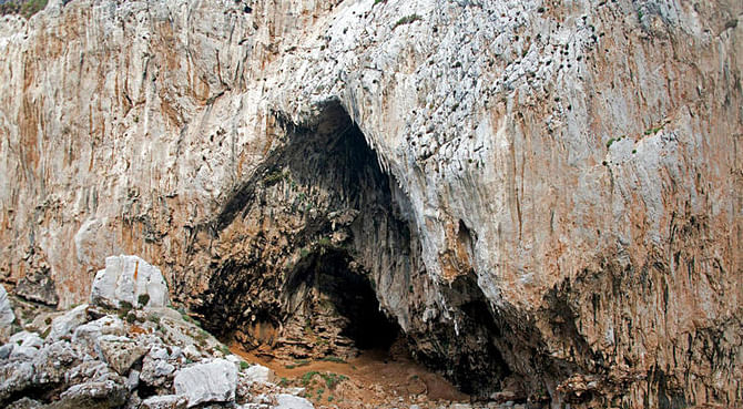 Gorham's Cave, photographed from Governor's Beach, Gibraltar. (Courtesy of Stewart Finlayson)