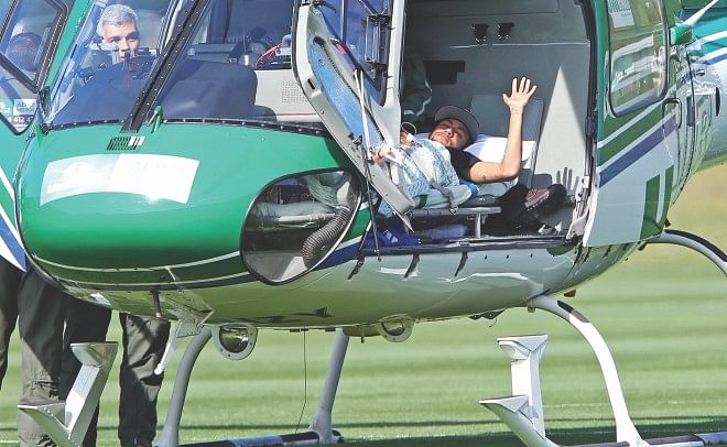 This handout photo shows Brazil superstar Neymar lying in a medical helicopter at the team's Granja Comary training centre in Teresopolis on Saturday. PHOTO: GETTY IMAGES