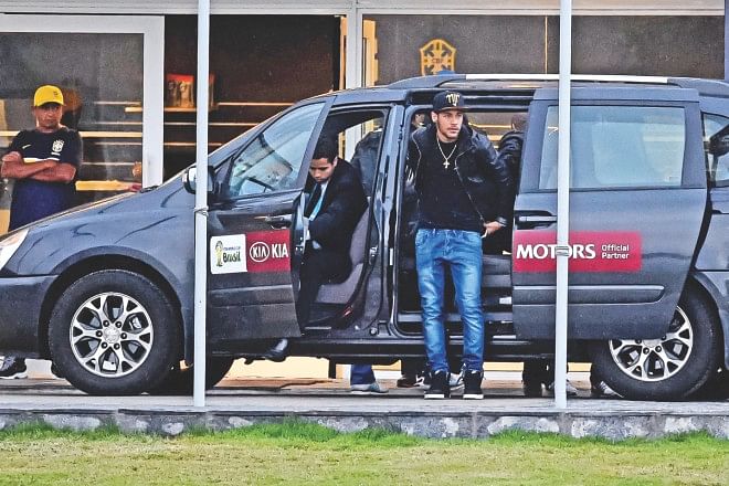 Injured Brazil striker Neymar arrives at the team's training centre in Teresopolis on Thursday. PHOTO: GETTY IMAGES