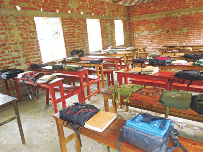 The room of Class IX of Parashmoni High School lies empty as the students were asked to join the programme, leaving schoolbags and books there. PHOTO: STAR