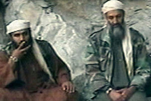 Abu Ghaith, left, with Osama bin Laden, in a video from after the September 11 attacks. This photo is taken from The New York Times.