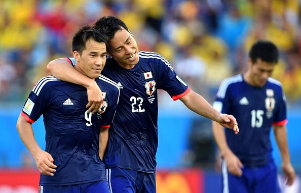Shinji Okazaki (L) of Japan celebrates scoring his team's first goal with his teammate Maya Yoshida during the 2014 FIFA World Cup Brazil Group C match between Japan and Colombia at Arena Pantanal on June 24, 2014 in Cuiaba, Brazil. Photo: Getty Images