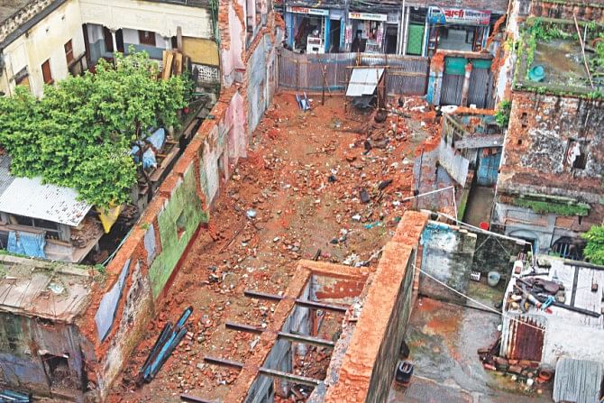 Only some beams are now visible on the spot in Shankhari Bazar where Kalachand Temple used to stand before being demolished in July. The photos were taken recently. Photo: Star