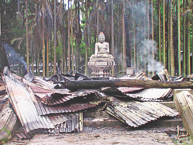 Only one idol stands amid the carnage at a Buddhist temple in Ramu of Cox's Bazar on this day two years ago. Photo: File