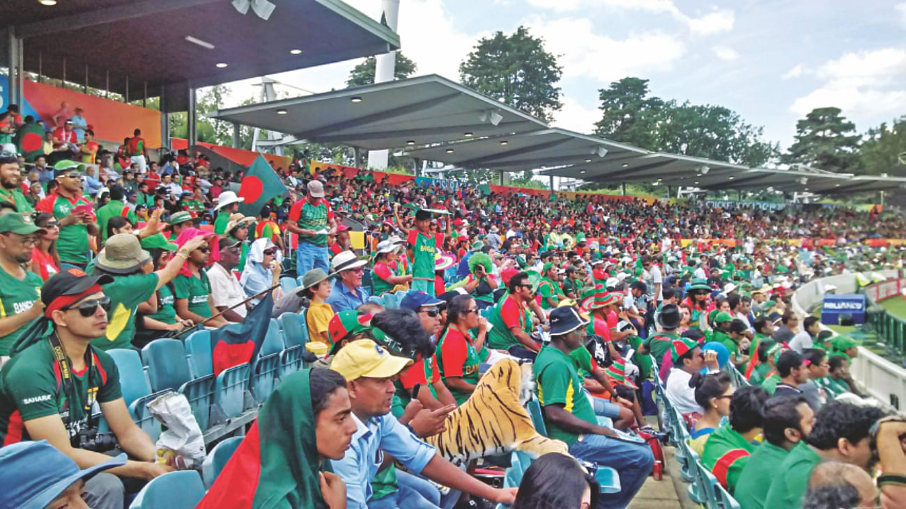 The red-and-green is the dominating colour in the stands. Photos: Bishwajit Roy and Internet 