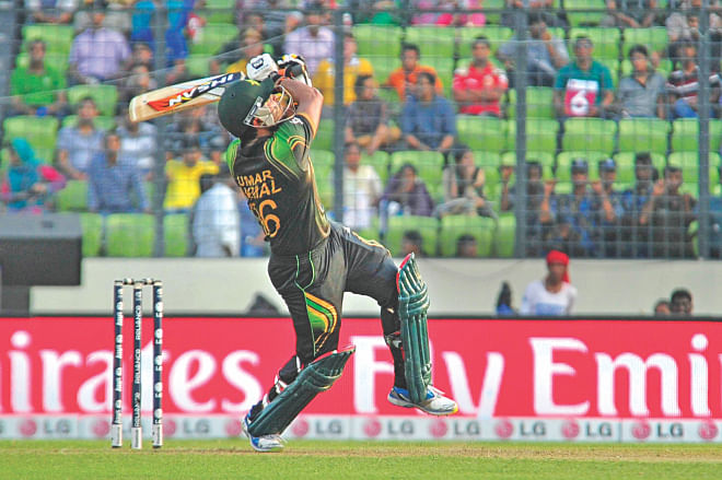 The talent of Umar Akmal was on display at the Sher-e-Bangla National Stadium in Mirpur yesterday. Here the right-handed Pakistan batsman is seen cutting the ball square of the wicket during his superb 94 against Australia in their ICC World T20 Group A match. PHOTO: FIROZ AHMED