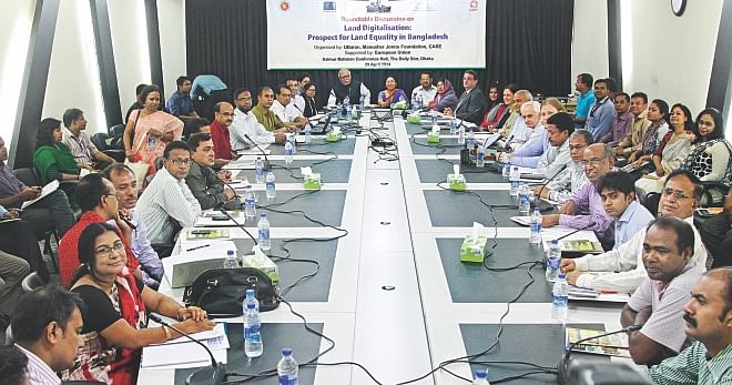 Participants at a roundtable on “Land Digitalisation: Prospect for Land Equality in Bangladesh” organised by Manusher Jonno Foundation, Uttaran, and CARE at The Daily Star Centre in the capital yesterday. Shamsur Rahman Sherif, the land minister, and Abdul Mannan, director general of the Directorate of Land Records and Survey, attended the discussion as the chief guest and special guest respectively. Photo: Star