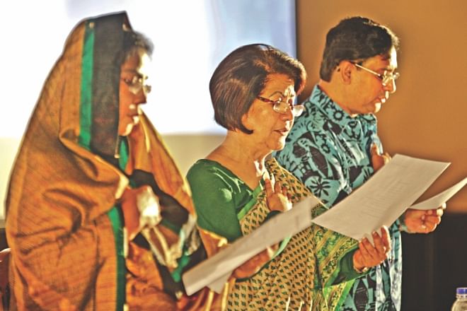 Meher Afroze Chumki, Rokia Afzal Rahman, and Rizwan-ul-Alam read out the oath. PHOTO: STAR