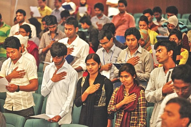 Participants take an oath to fight corruption at the opening of a two-day debate hosted by Transparency International, Bangladesh at the capital's Bangla Academy yesterday.  PHOTO: STAR