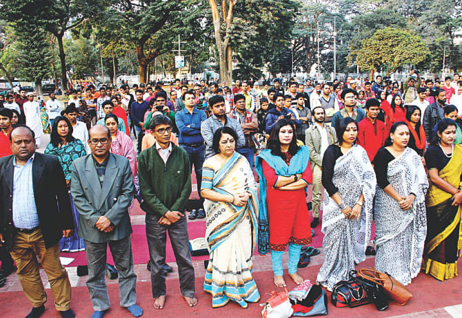One minute's silence of Samillito Sangskritik Jote at Central Shaheed Minar. Photo: Star