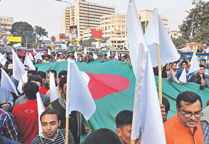 A white flag procession of Shantir Jonno Hok Protibad at Shahbagh. Photo: Star