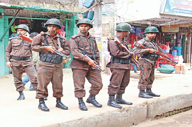 Law enforcers on the watch for trouble.   Photo: Star 