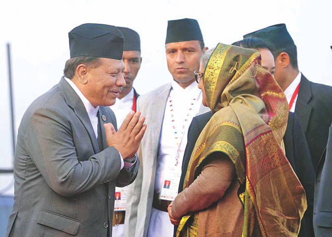 Nepalese Deputy Prime Minister Prakash Man Singh welcomes Bangladesh Prime Minister Sheikh Hasina on her arrival at Tribhuvan International Airport in Kathmandu yesterday.  Photo: Courtesy