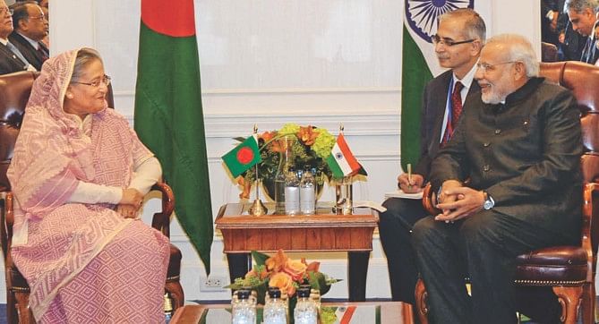 Prime Minister Sheikh Hasina and her Indian counterpart Narendra Modi during their maiden meeting at New York Palace hotel yesterday. Photo: PID
