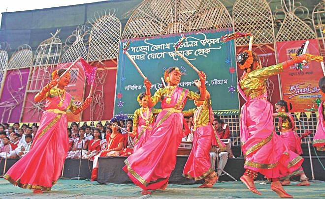 Child artistes performing a dance move at a cultural programme, organised by the Sammilito Pahela Baishakh Udjapon Parishad, to bid farewell to the outgoing Bangla year at DC Hill premises in Chittagong yesterday. Photo: Anurup Kanti Das