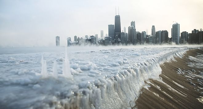 Ice builds up along Lake Michigan at North Avenue Beach as temperatures dipped well below zero in Chicago, Illinois, yesterday. Photo: AFP