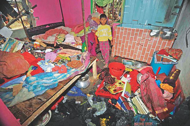 The house of a Hindu family in Malopara village in Jessore bears the signs of a post-polls attack. 