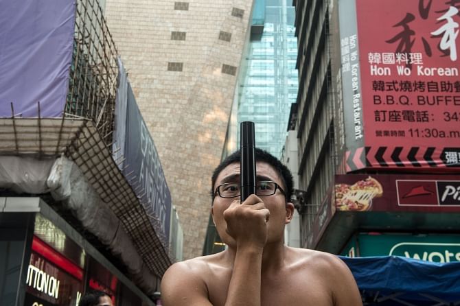 A member of the Occupy movement makes a speech in the Mongkok district. Photo: AFP