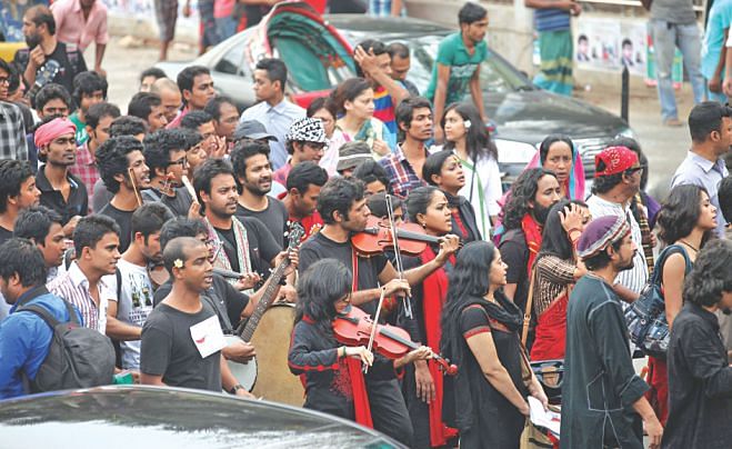 Procession “Laljatra” parades Dhaka University