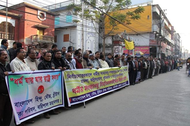 Different organisations in several districts yesterday stage protests against attacks on Hindus in Jessore and some other districts by BNP and Jamaat-Shibir men during and after the January 5 parliamentary elections. Photos show human chains in Barisal. Photo: Star