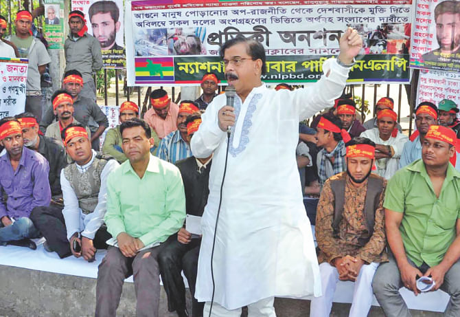 At the capital's Jatiya Press Club, where several organisations condemned the political violence, Nagorik Oikya Convener Mahmudur Rahman Manna addresses a sit-in of the National Labour Party. Photo: Star, Banglar Chokh