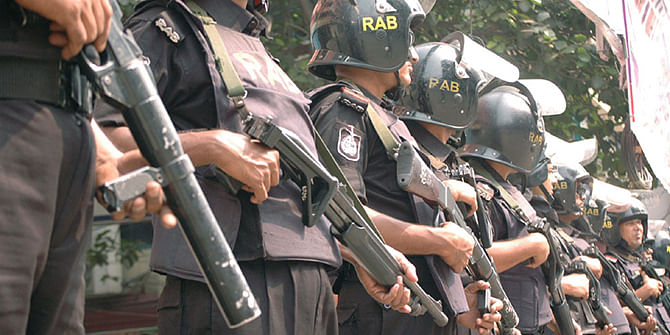 This undated file photo shows Rab men standing guard in the capital.